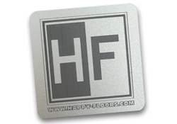 Metal name badges, logo only.